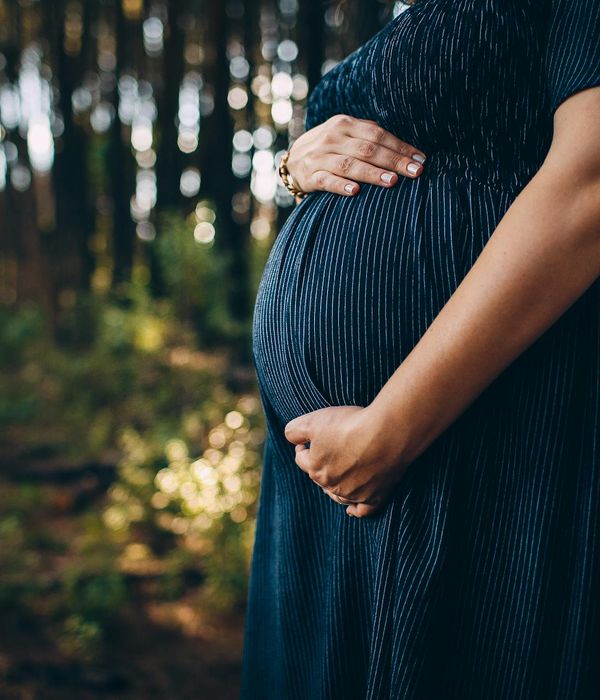 Woman with a serene and focused gaze, embodying calmness.